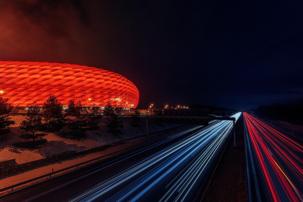 football stadium, highway, night, taillights, car lights, speed, driving a car, stadium, light strips, night shot, dark, long time exposure, long term, football stadium, highway, speed, speed, speed, speed, speed, stadium, stadium, stadium, stadium